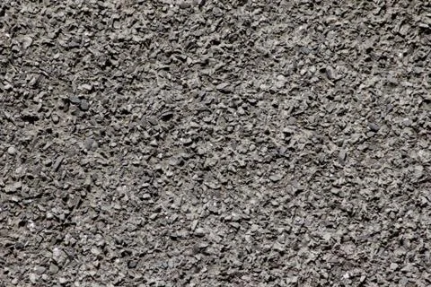 Texture consisting of small stones of different sizes of gray. Stock Photos