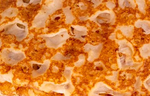 Texture of a cooked thin pancake Stock Photos