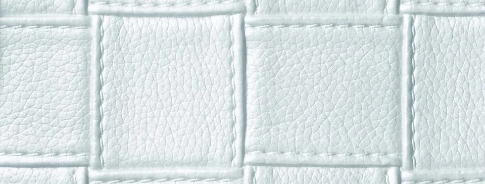 Texture cool white leather background with quilted stitched pattern, macro. A Stock Photos