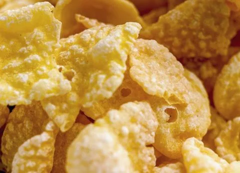 Texture of corn flakes, muesli for breakfast close-up, shallow depth of field Stock Photos