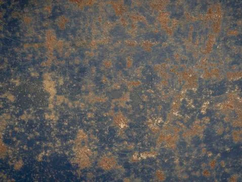 Texture of corrosion on the metallic surface Stock Photos