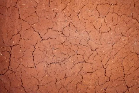 Texture cracked clay surface. Adobe african buildind wall Stock Photos