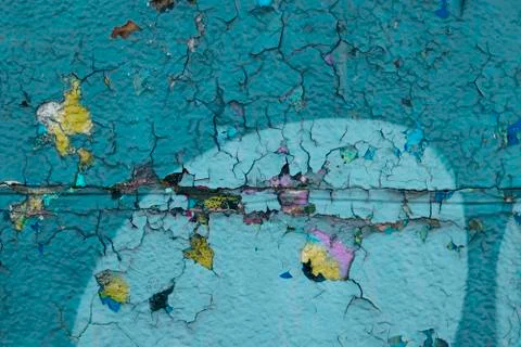 The texture of cracked paint in several multi-colored layers Stock Photos