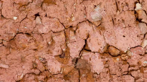 Texture of cracked red old brick close-up. Slow motion Video stock 158928152