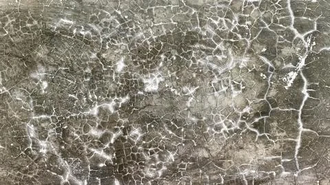 Texture of cracks on a damp wall due to rainy weather Stock Photos