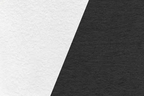 Texture of craft black and white paper background, half two colors, macro. 스톡 일러스트