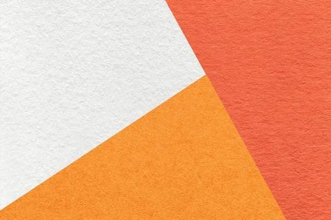 Texture of craft brick, white and orange shade color paper background, macro. Stock Photos