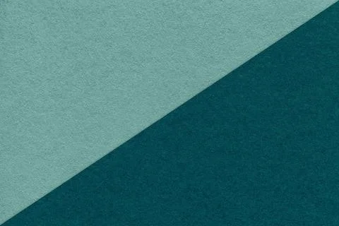 Texture of craft cyan and emerald paper background, half two colors, macro. Foto stock