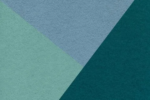 Texture of craft cyan, emerald and blue shade color paper background, macro. Stock Photos
