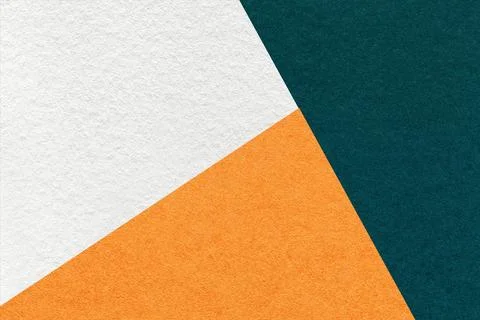 Texture of craft emerald, white and orange shade color paper background, macr Stock Photos