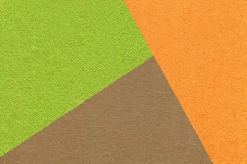Texture of craft green, orange and brown shade color paper background, macro. 스톡 사진