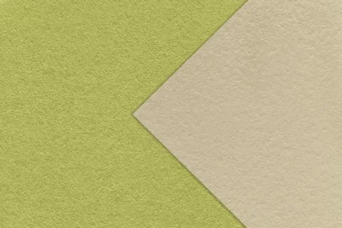 Texture of craft green paper background, half two colors with beige arrow Stock Photos