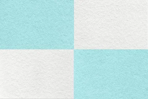 Texture of craft light blue and white paper background with cells pattern, ma Stock Photos
