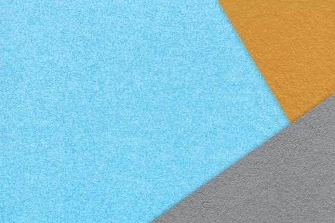 Texture of craft light blue color paper background with orange and gray borde Stock Photos