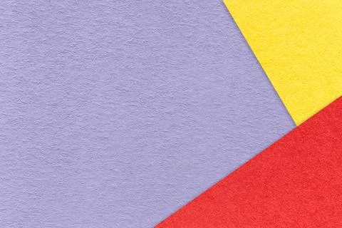 Texture craft light violet paper background with red and yellow border. Stock Photos