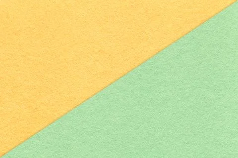 Texture of craft light yellow and green paper background, half two colors, ma Stock Photos