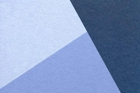 Texture craft navy blue, denim and sky shade paper background, macro. Stockfoto's