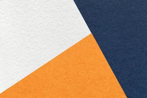 Texture of craft navy blue, white and orange shade color paper background, .. Stock Photos