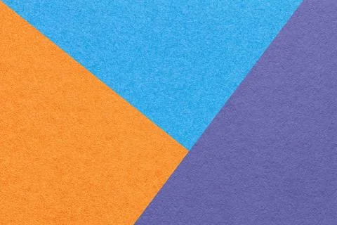 Texture of craft orange, violet and blue shade color paper background, macro. Stock Photos