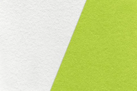 Texture of craft white and light green paper background, half two colors. Stock Photos