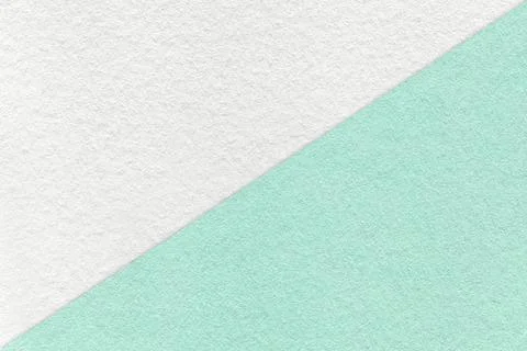 Texture of craft white and light cyan paper background, half two colors, macr Stock Photos