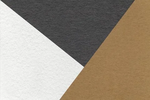 Texture of craft white, brown and black shade color paper background, macro. Stock Photos