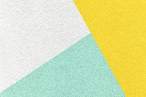 Texture craft white, light cyan and yellow color paper background, macro Stockfoto's