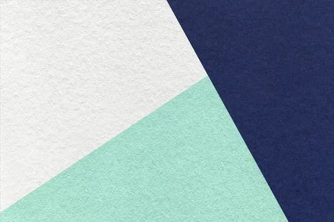 Texture of craft white, navy blue and cyan shade color paper background, macr Stockfoto's