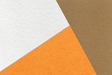 Texture of craft white, orange and brown shade color paper background, macro Stock Photos