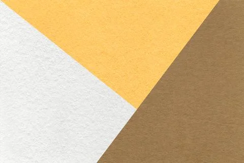 Texture of craft white, yellow and brown shade color paper background, macro. Stock Photos