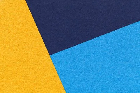 Texture of craft yellow, navy blue and cerulean shade color paper background Stock Illustration