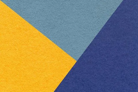 Texture of craft yellow, navy blue and denim shade color paper background, ma Stock Photos