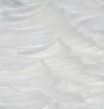 Texture of cream on white background Stock Photos