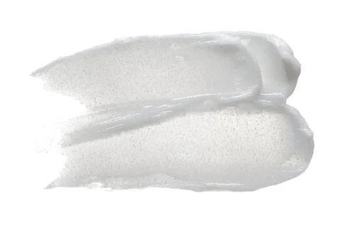 Texture of cream on white background Stock Photos