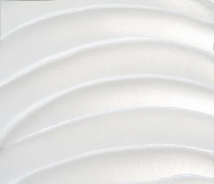 Texture of cream on white background Stock Photos