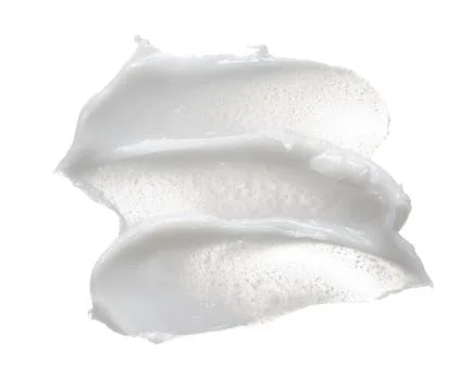 Texture of cream on white background Stock Photos