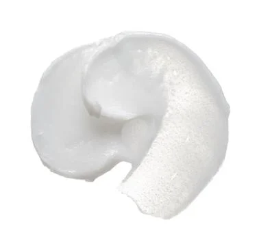 Texture of cream on white background Stock Photos