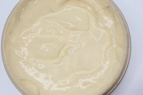 Texture of creams on white background Stock Photos