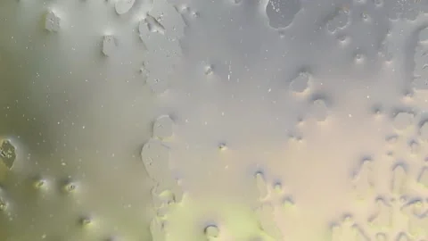 Texture created by water on a glass, drops of water running down a window Stock Footage 238075887