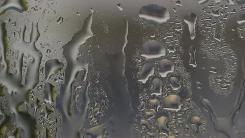 Texture created by water on a glass, drops of water running down a window Stock Footage 238075888