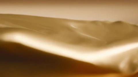 Texture of a crinkled plastic sheet, displaying a blend of metallic silver and Video stock 253926317