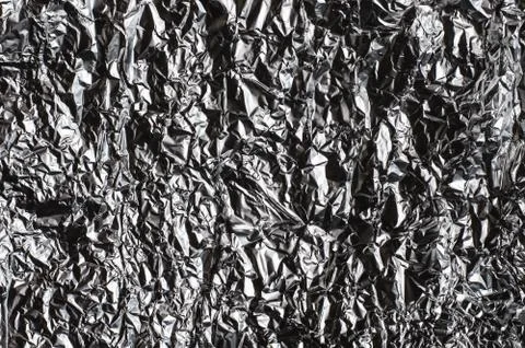 Texture of crumpled foil. Background image. Stock Photos