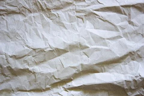 Texture of crumpled paper. Light textured background. Stock Photos