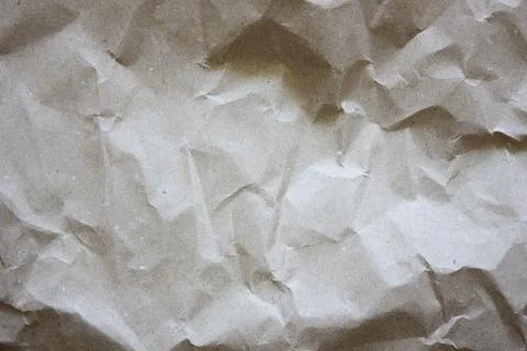 Texture of crumpled paper. Light textured background. Stock Photos