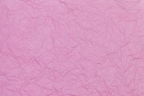 The texture of crumpled pink paper. Flat lay Stock Photos