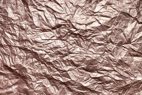 Texture crumpled shiny smooth packaging beige paper Stock Photos