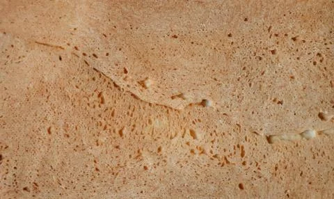 The texture of the crust of baked bread. Foto stock