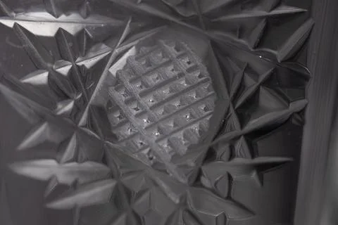 The texture on the crystal cut cups is closely Stock Photos