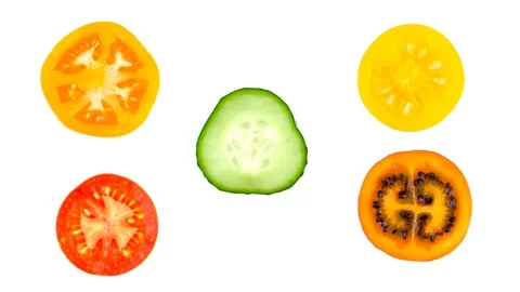 Texture of a cut tomato slices rotating on white background. Healthy food Stock Footage 115431338