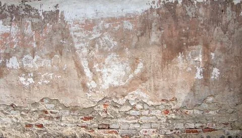 Texture of damaged brick wall close up Fotos Stock